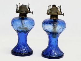 A pair of Early 20th Century Bristol Blue glass oil lamps. 22cm