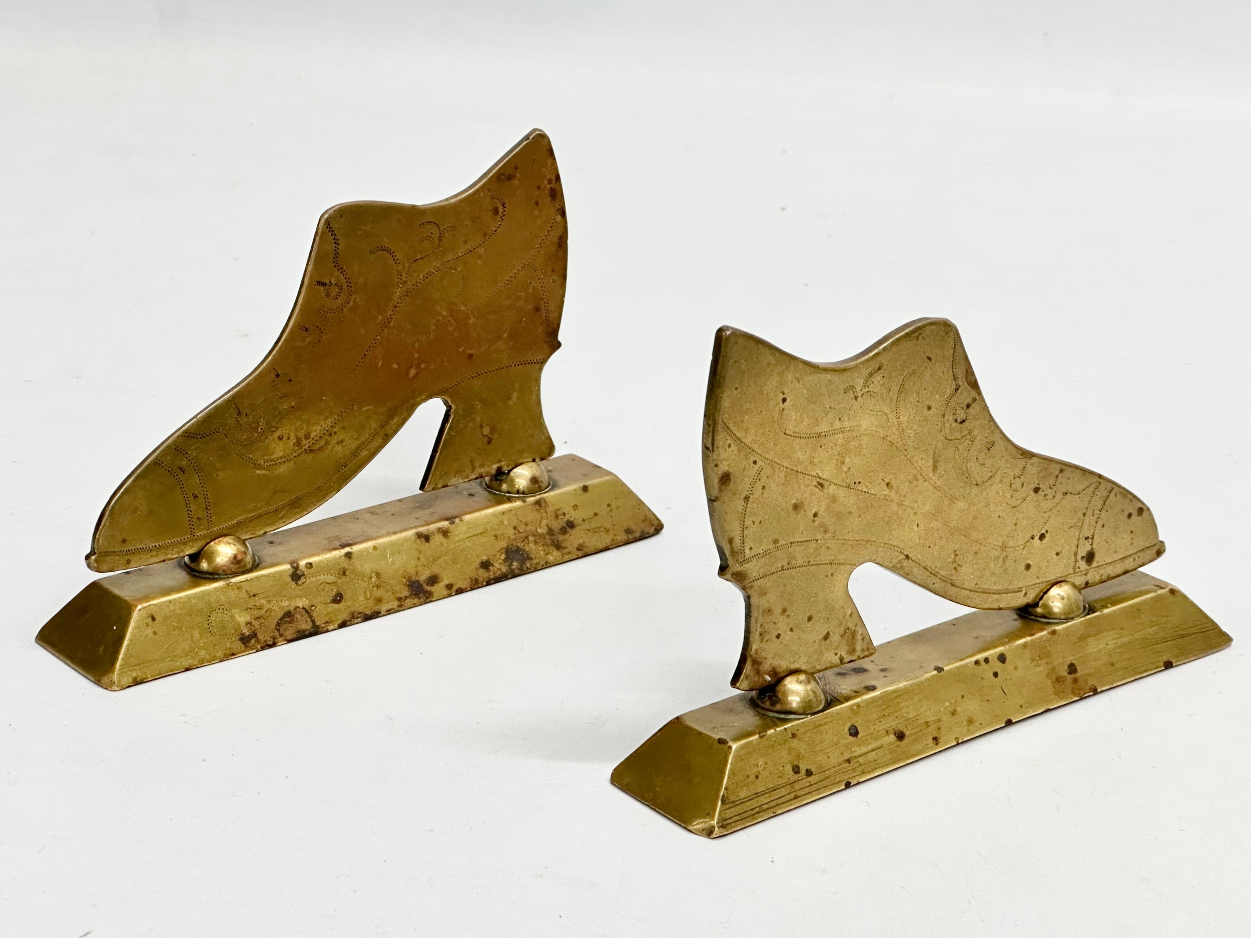 Victorian brassware. A pair of Victorian brass fireplace stands with a pair of Victorian brass taps. - Image 3 of 4