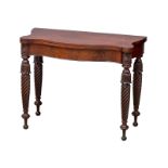 A William IV mahogany serpentine front turnover tea table on turned legs. Circa 1830. 87x44x75cm