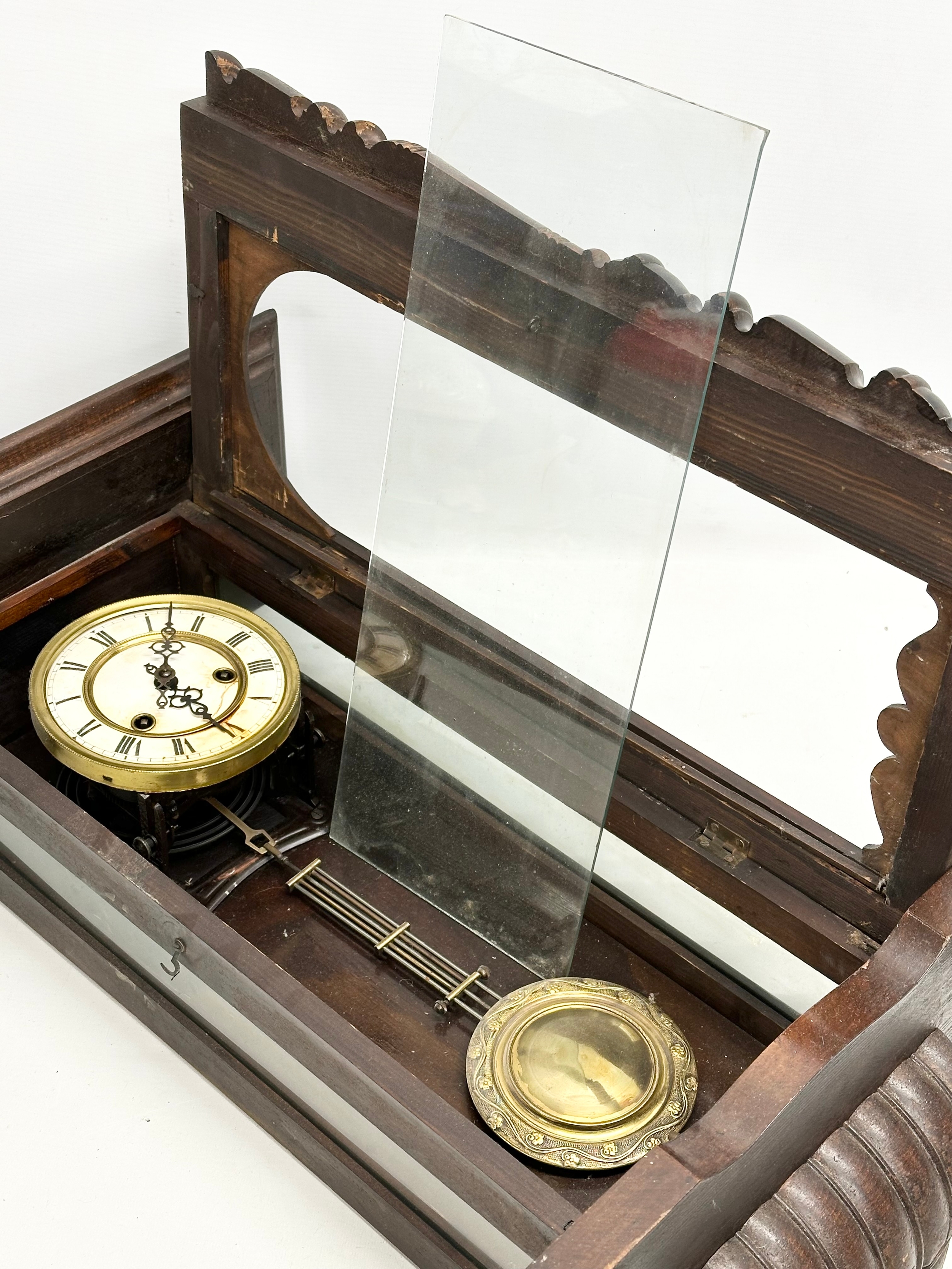 A Late 19th Century Victorian mahogany Vienna wall clock. With key and pendulum. 42x64cm - Image 4 of 5