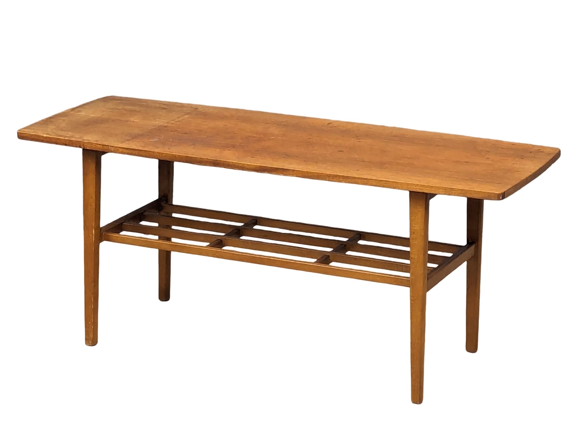 A Mid Century teak 2 tiered coffee table by Nathan. 107x40.5x45.5cm