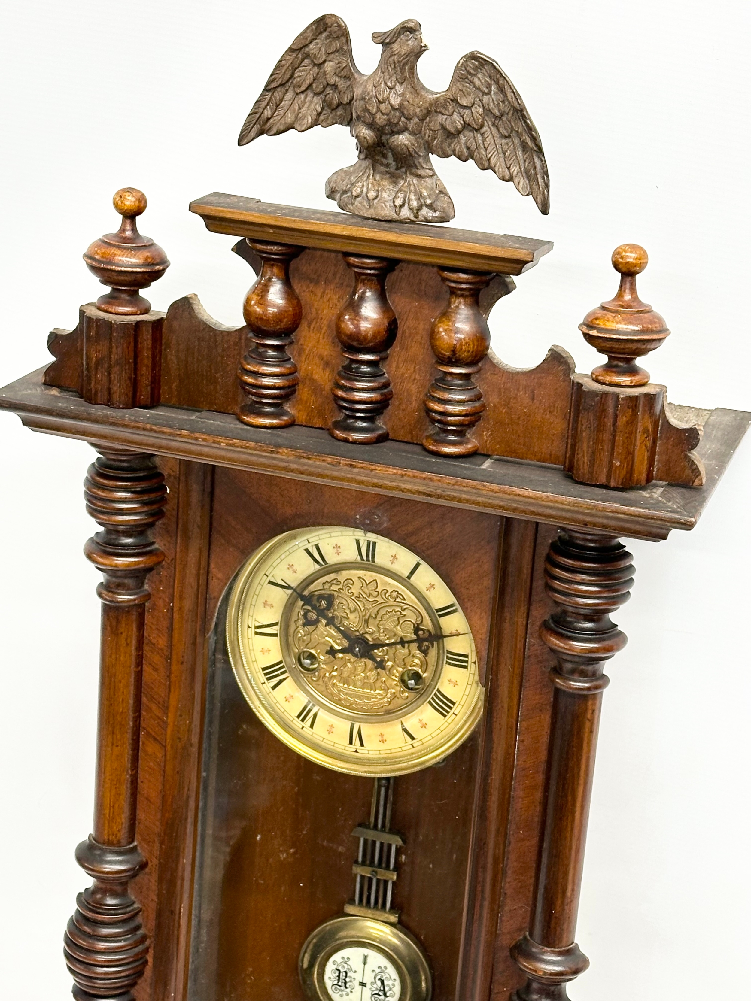 A Late 19th Century Victorian spring Vienna wall clock. With key and pendulum. 34x82cm - Image 3 of 4