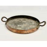 A Late 19th Century Johnson & Ravey copper 2 handled pan. 49x37x7cm