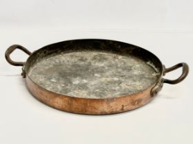 A Late 19th Century Johnson & Ravey copper 2 handled pan. 49x37x7cm