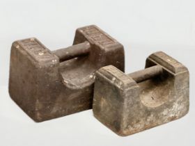 2 cast iron weights. 56lb, 28lb.