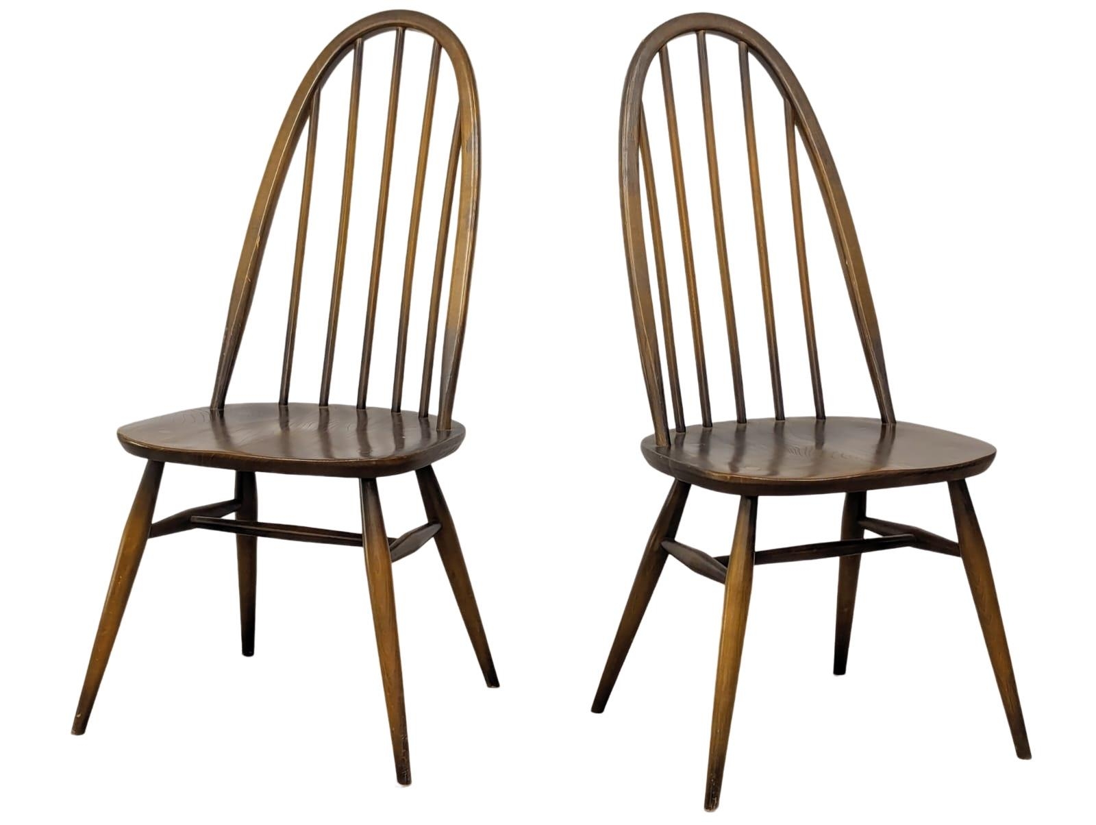 A pair of Ercol Mid Century elm and beech chairs