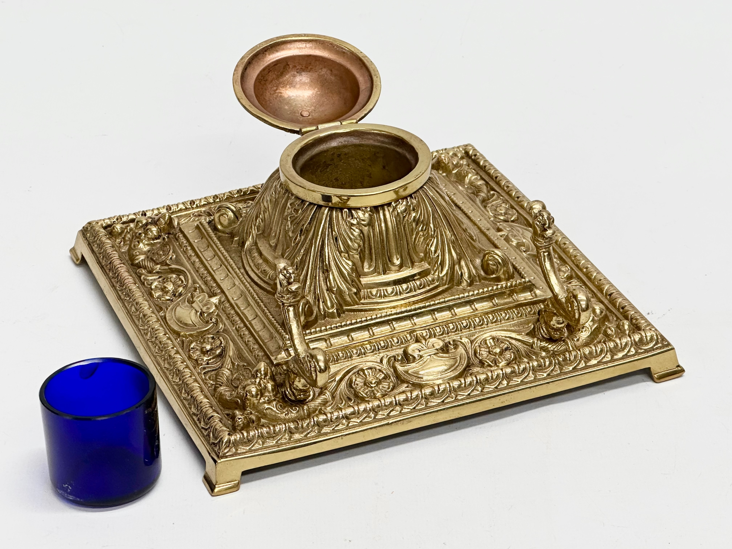 A Late 19th Century Victorian brass inkstand/inkwell with original Bristol Blue liner. 18.5x18. - Image 4 of 6