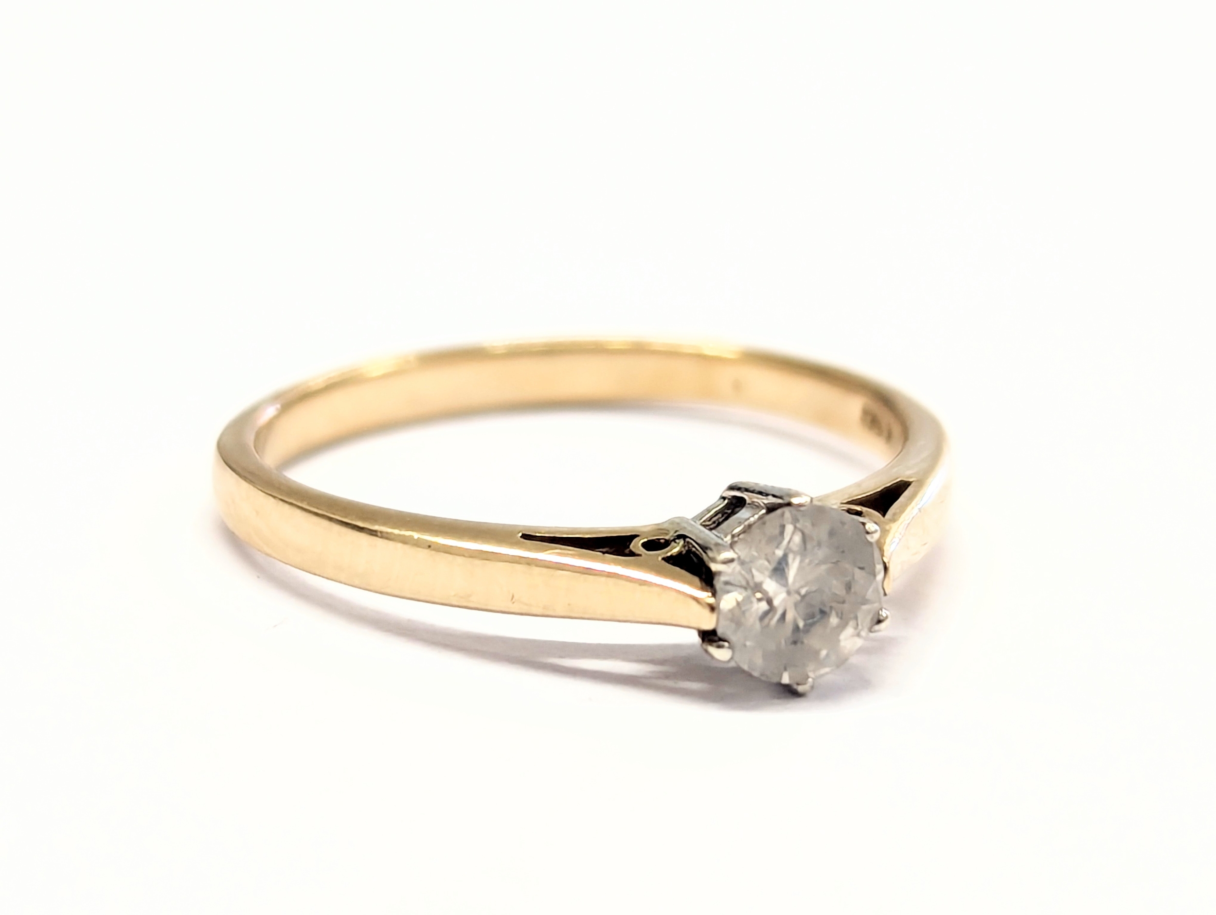 A 9ct gold and diamond ring. 1.8g. Size UK N. - Image 4 of 4