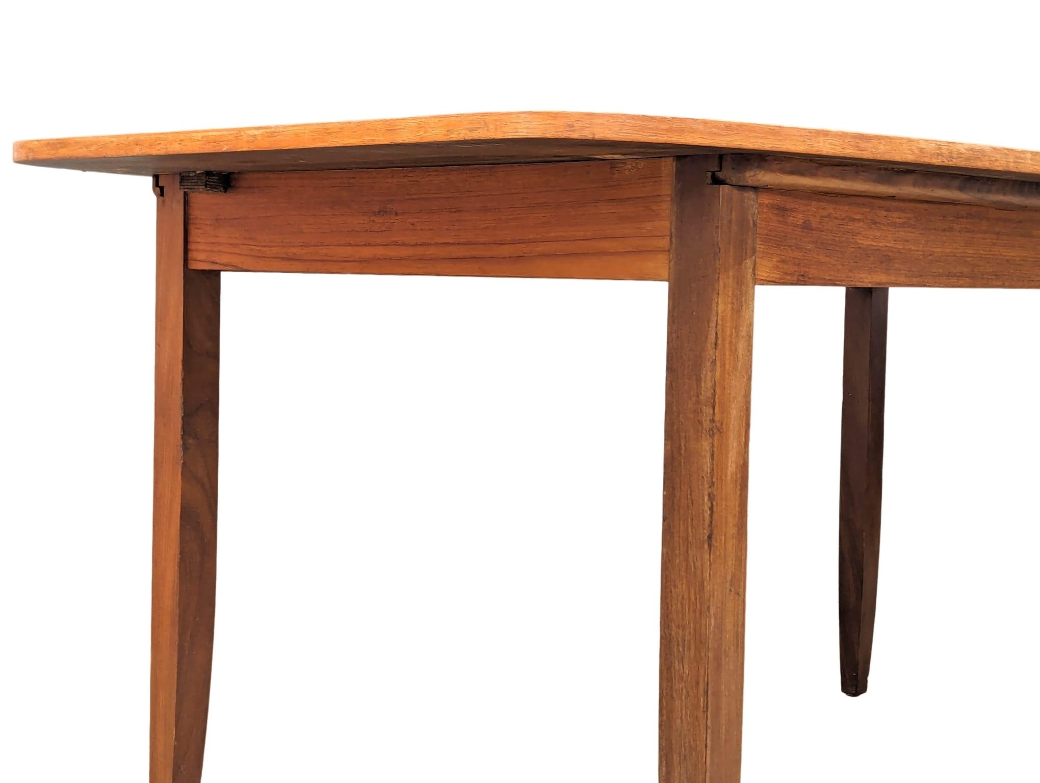 A mid century teak table and 6 chairs, 168cm x 89cm x 75cm. Extended 211cm x 89cm x 75cm - Image 6 of 17