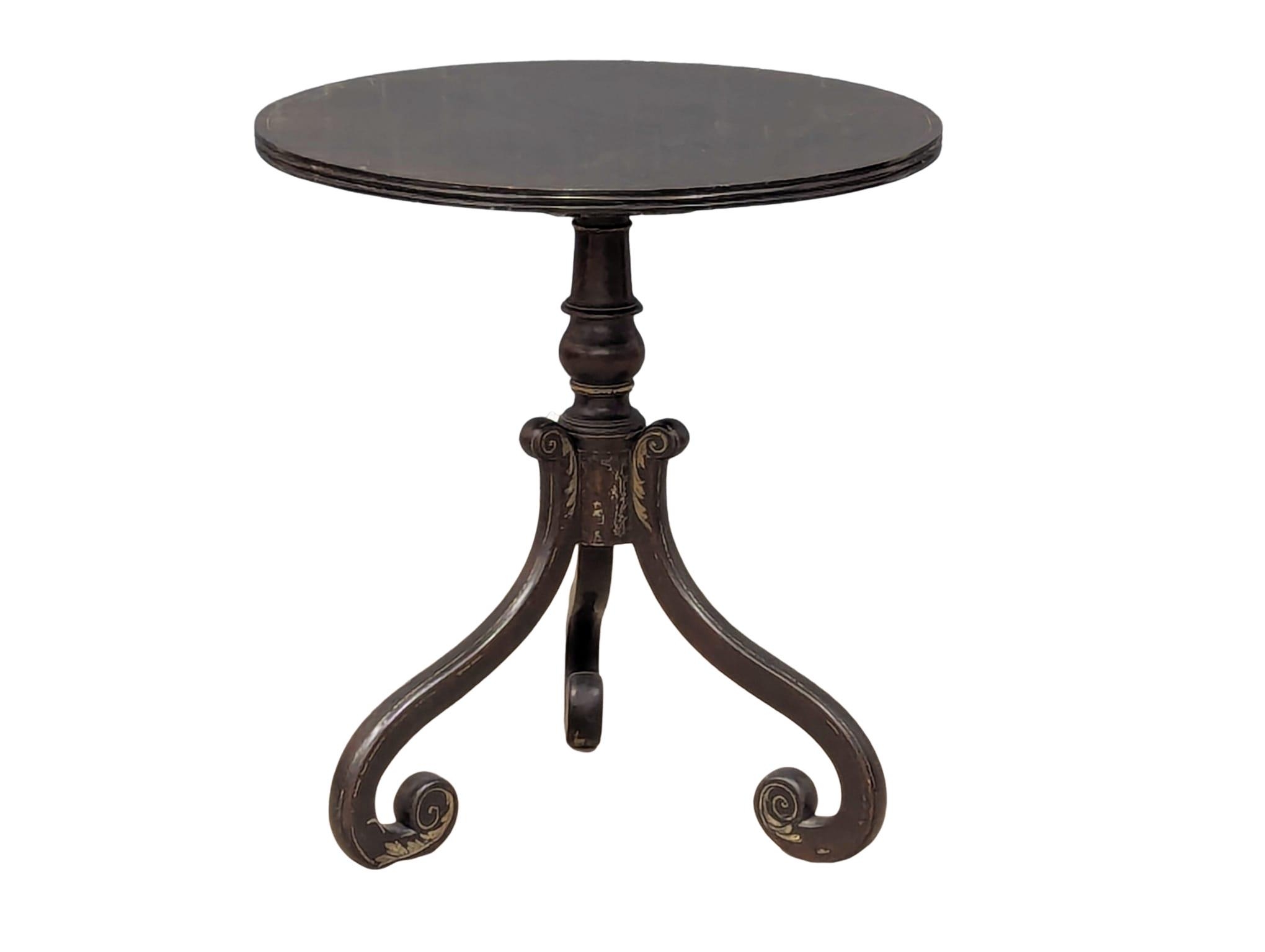 A Victorian ebonised pedestal occasional table. 55x60cm