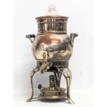 An Early 20th Century copper and brass tea urn. 34cm