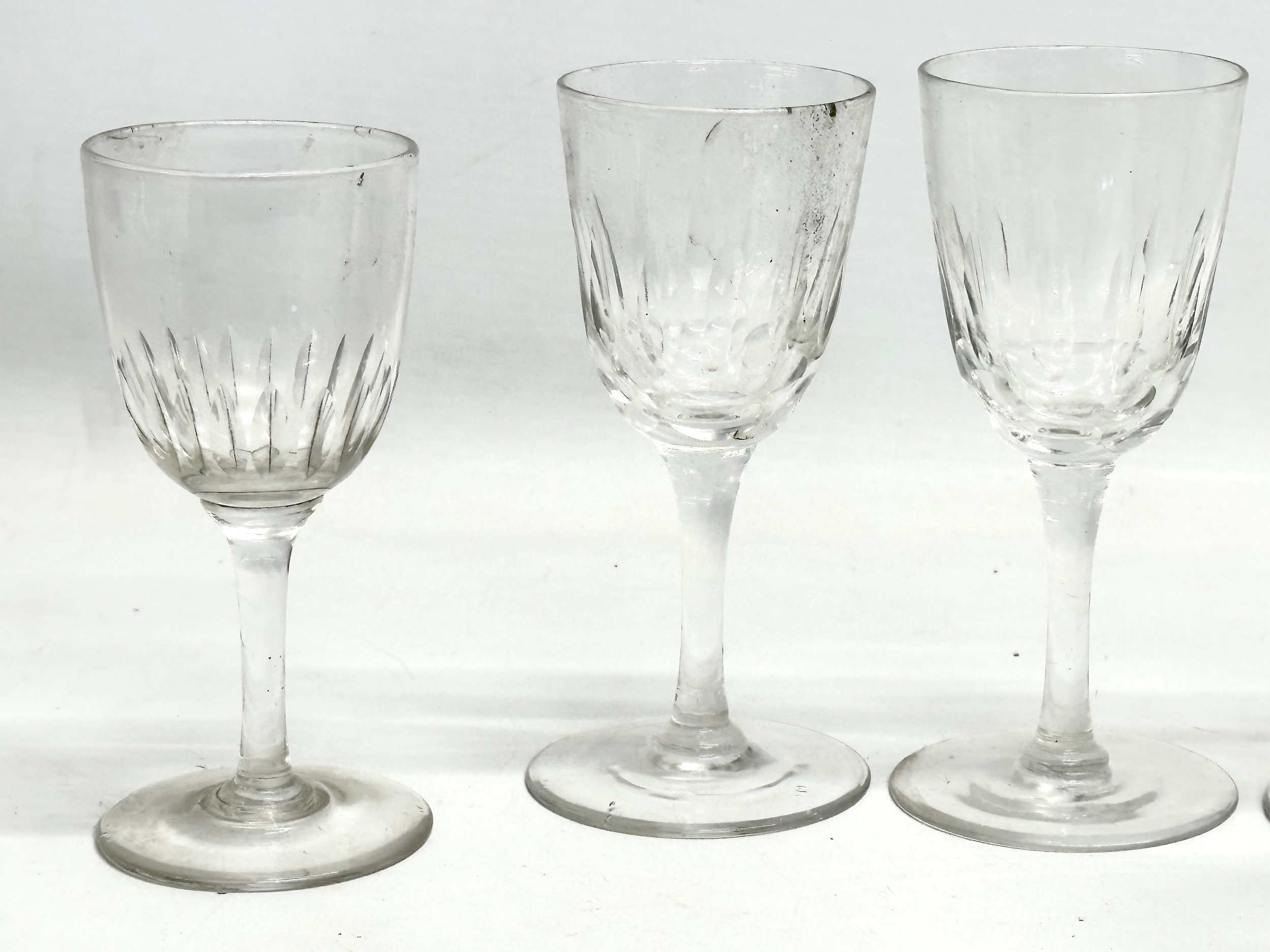 A collection of Mid/Late 19th Century Victorian slice lens cut drinking glasses. 13cm. 12cm. 11cm. - Image 8 of 9