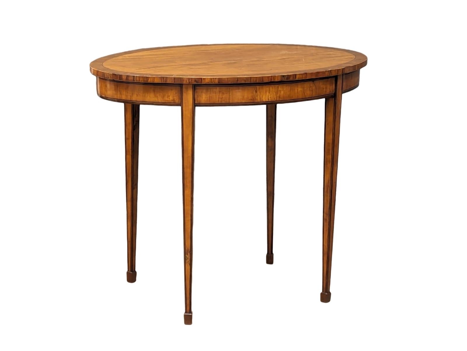 An Early 20th Century Sheraton Revival inlaid Satin and rosewood window table. Circa 1900. 88.5x60.