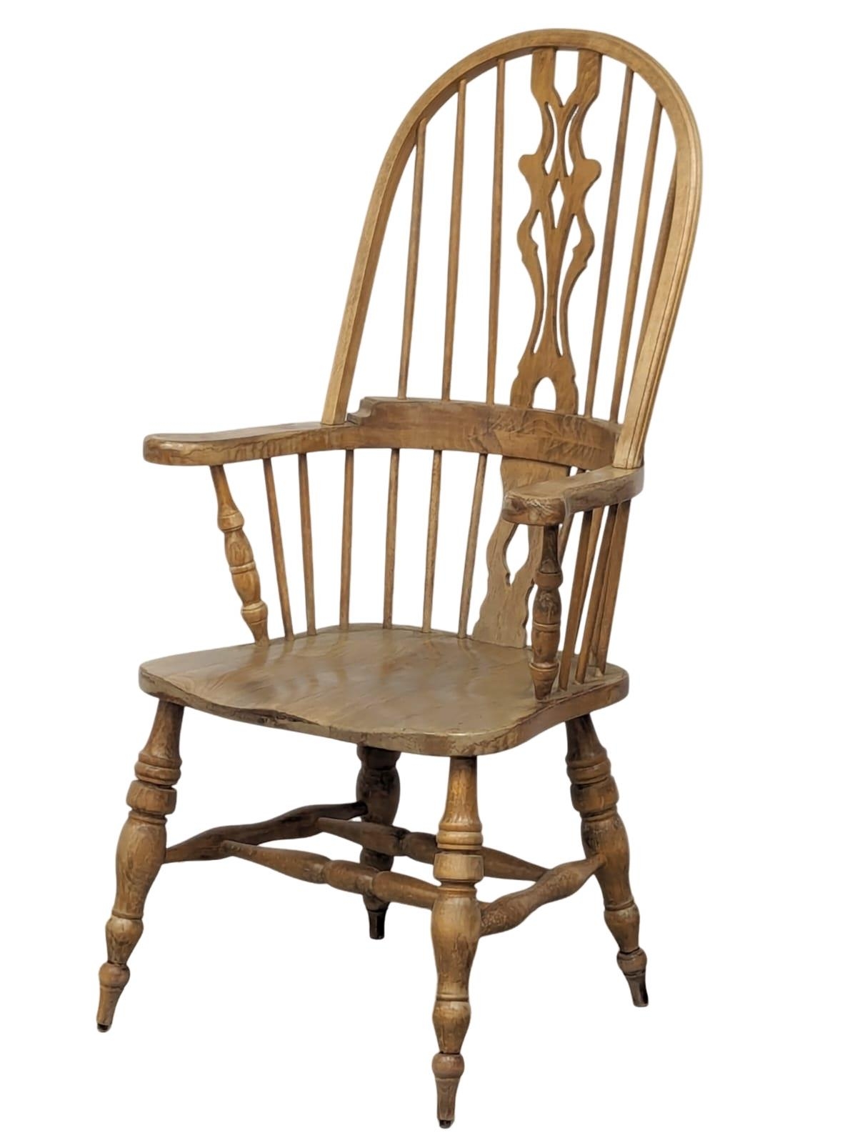 A 19th Century style Windsor armchair.