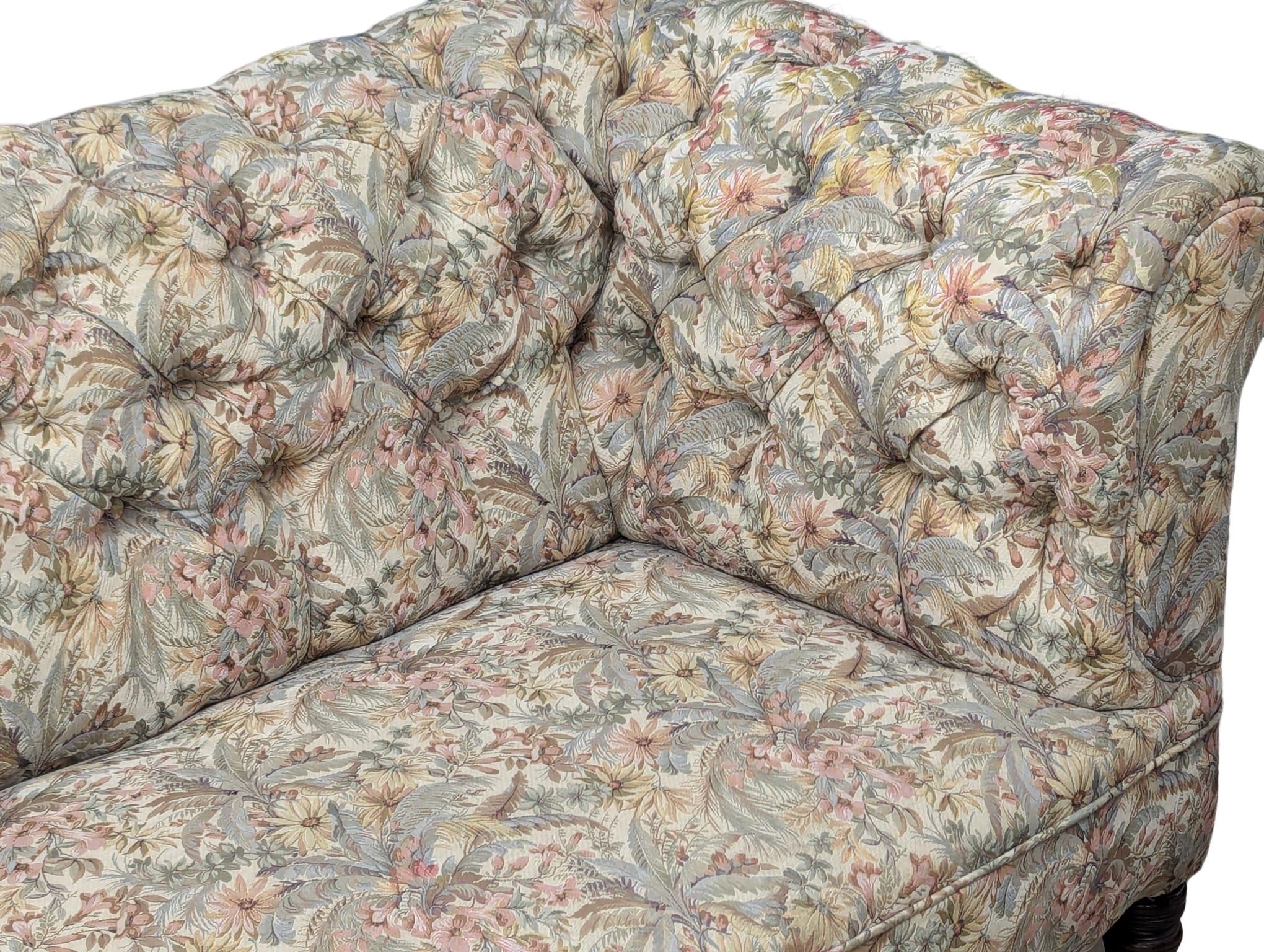 A Late 19th Century Victorian deep button back 2 seater sofa on turned legs. Circa 1880. 164.5cm - Image 4 of 5