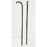 A silver mounted walking stick and other. 94cm