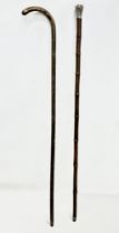 A silver mounted walking stick and other. 94cm