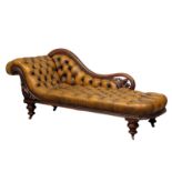 A good quality Early Victorian mahogany framed deep button leather chaise lounge. 204cm