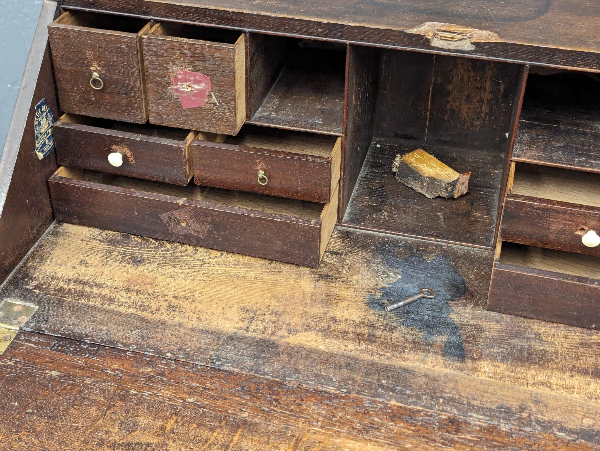 A George III oak writing bureau. Circa 1760-1780. 94x55x106cm - Image 3 of 10