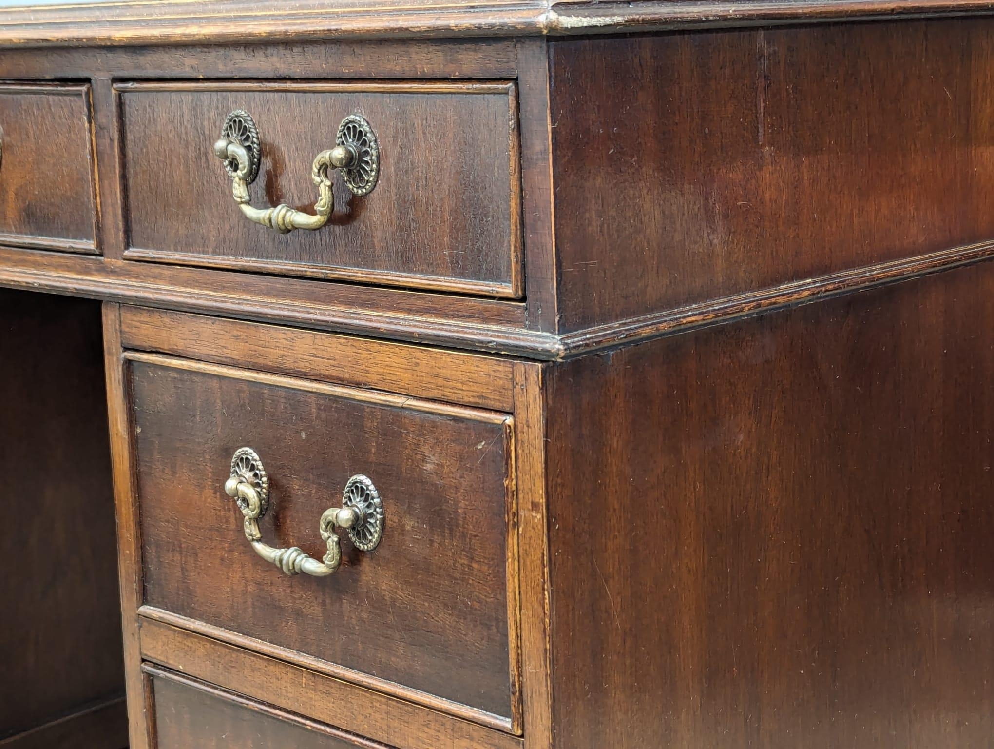 A George III style mahogany leather top desk, 118cm x 60cm x 77cm - Image 7 of 8