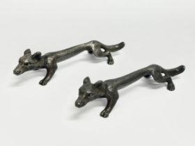 A pair of 19th Century fox knife rests. 11cm
