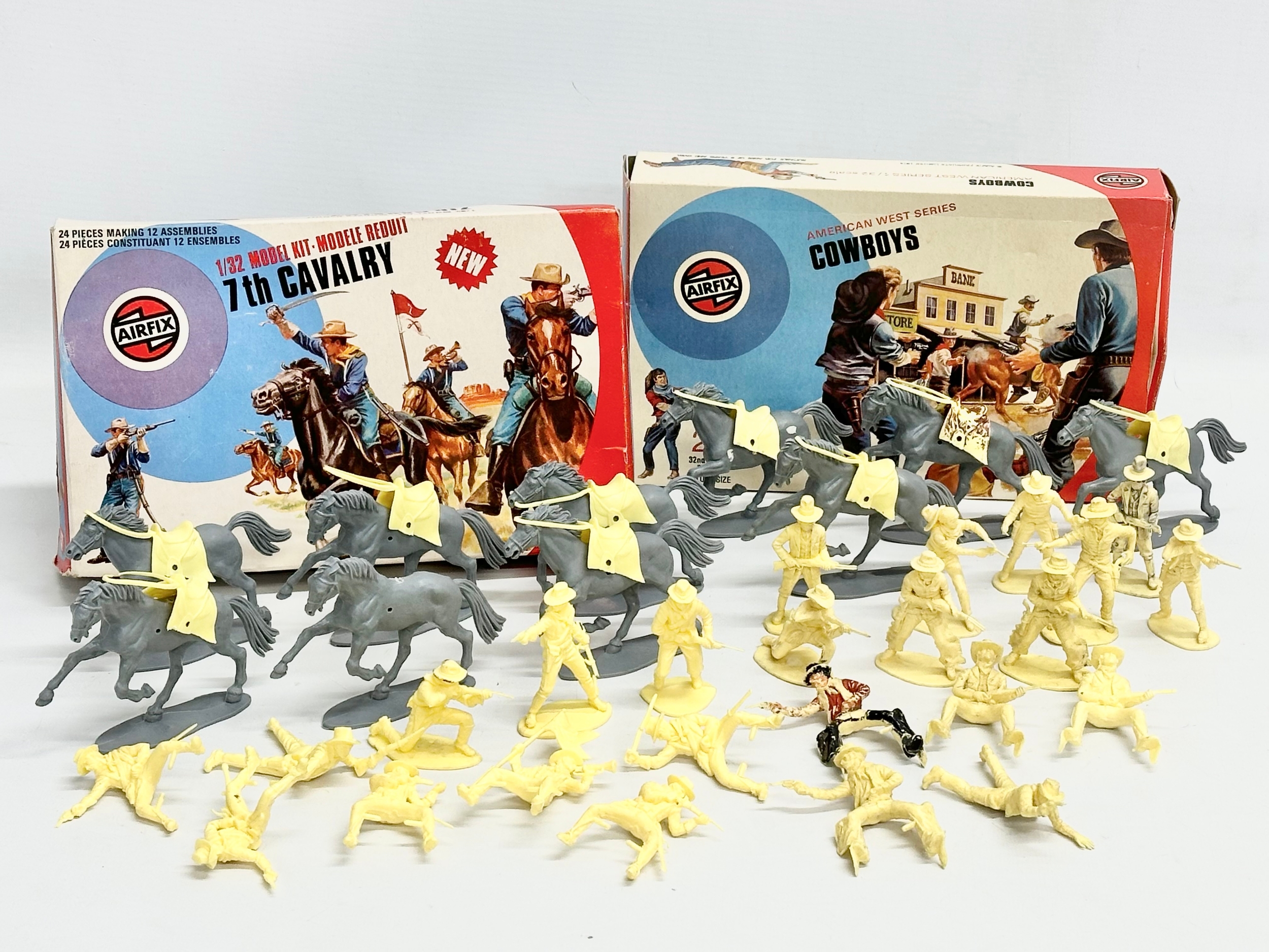 2 boxes of vintage Airfix model kits. Airfix American West Series Cowboys, 1/32 scale, 22 pieces.