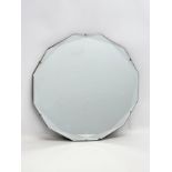 An Art Deco bevelled mirror. 48cm