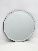 An Art Deco bevelled mirror. 48cm