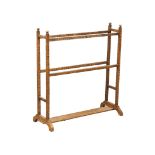 A Late Victorian simulated elm towel rail