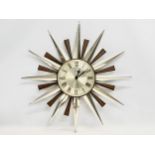 A Mid Century sunburst wall clock by Metamec. 60cm