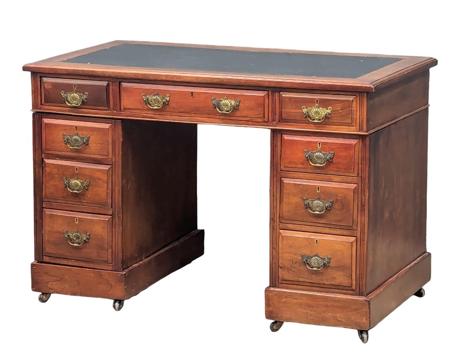 A late Victorian 3pc desk in walnut, 1880-90. 108cm x 59.5cm x 73.5cm
