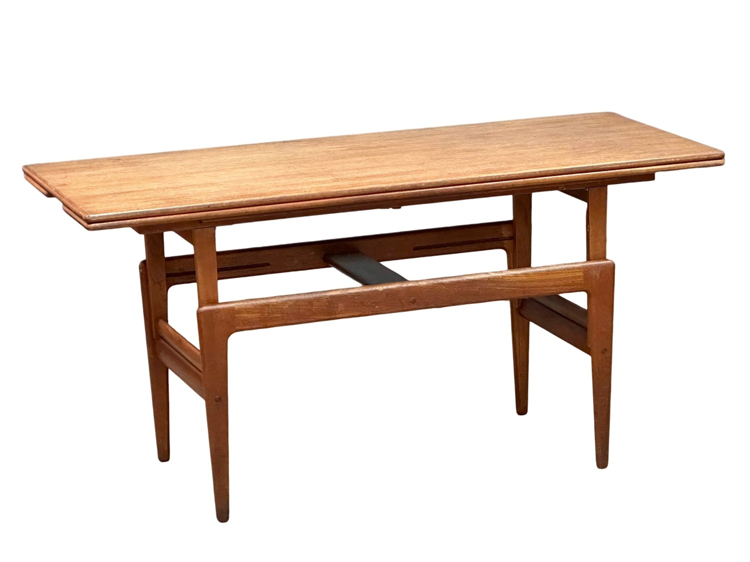 A Danish Mid Century teak ‘Elevator’ table designed by Kai Kristensen. Coffee table/dining table.