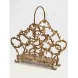 A vintage gilt metal magazine rack. 45x51cm