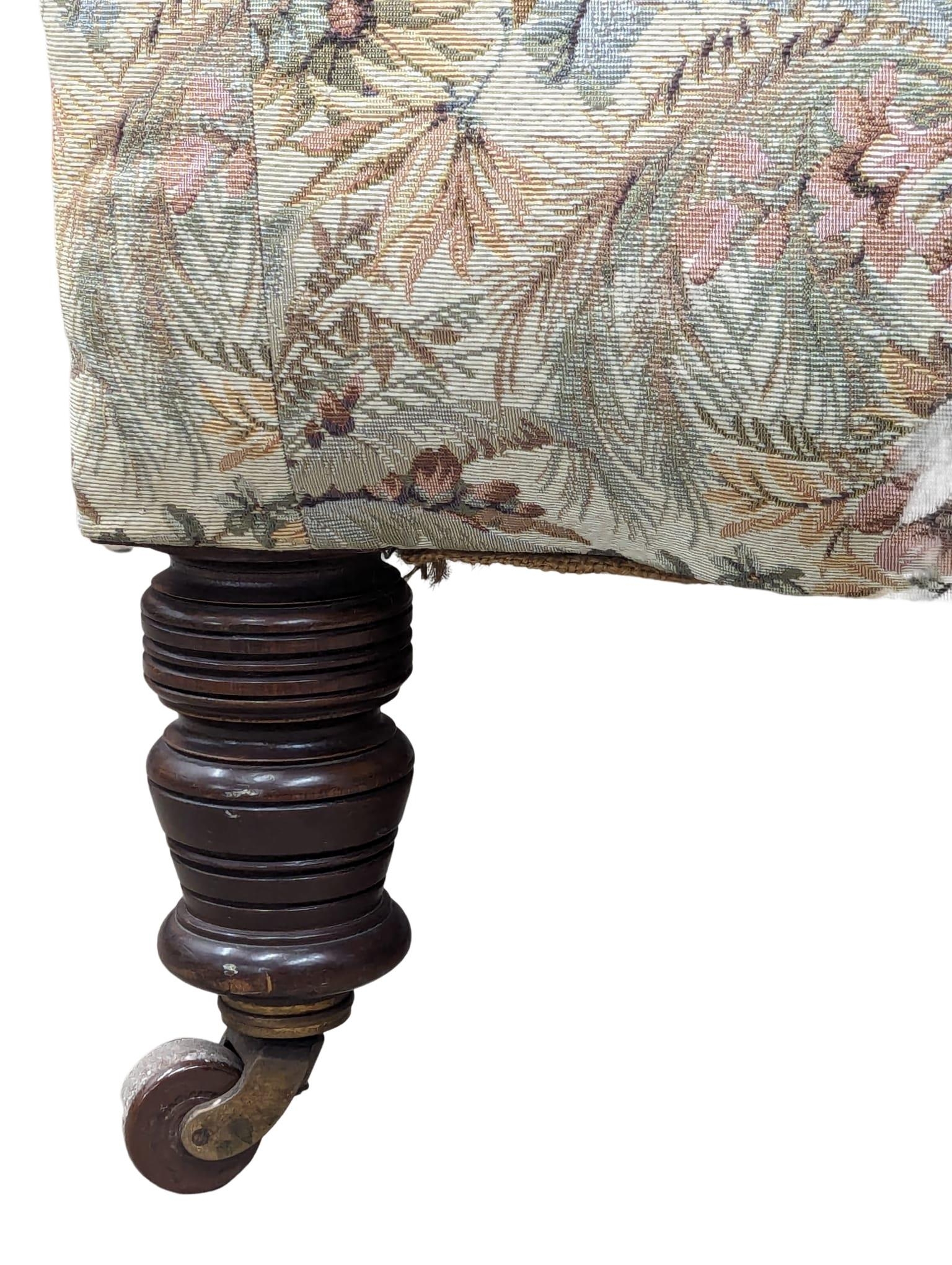 A Late 19th Century Victorian deep button back 2 seater sofa on turned legs. Circa 1880. 164.5cm - Image 2 of 5