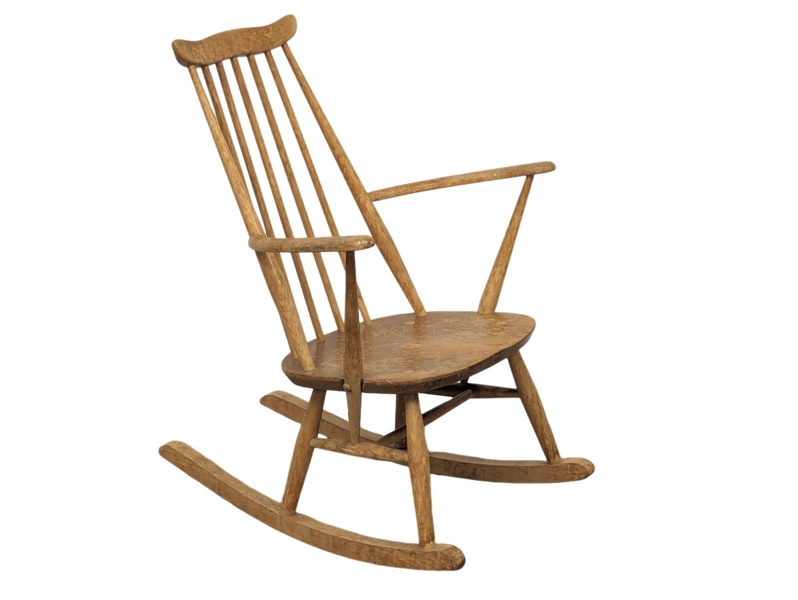 An Ercol Mid Century blonde elm and beech rocking chair - Image 2 of 5