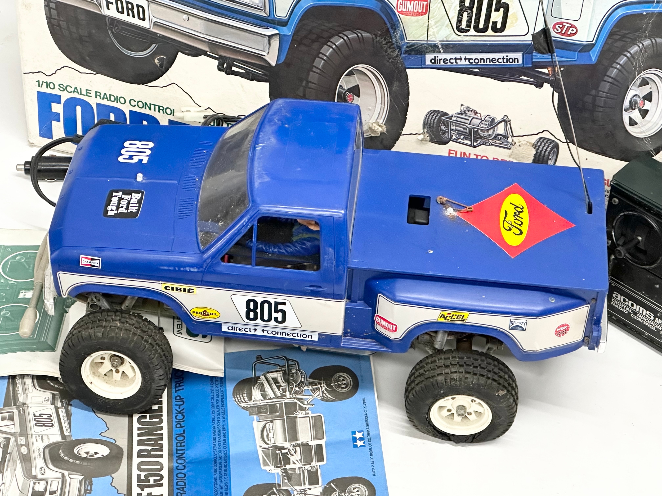 A Tamiya Riko Ford F 150 Ranger XLT radio control pick up truck with box. 1/10 scale. Remote and - Image 4 of 6