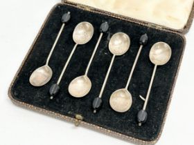 Silver cocktail spoons with case. C.B & S, Sheffield. 34.36 grams.