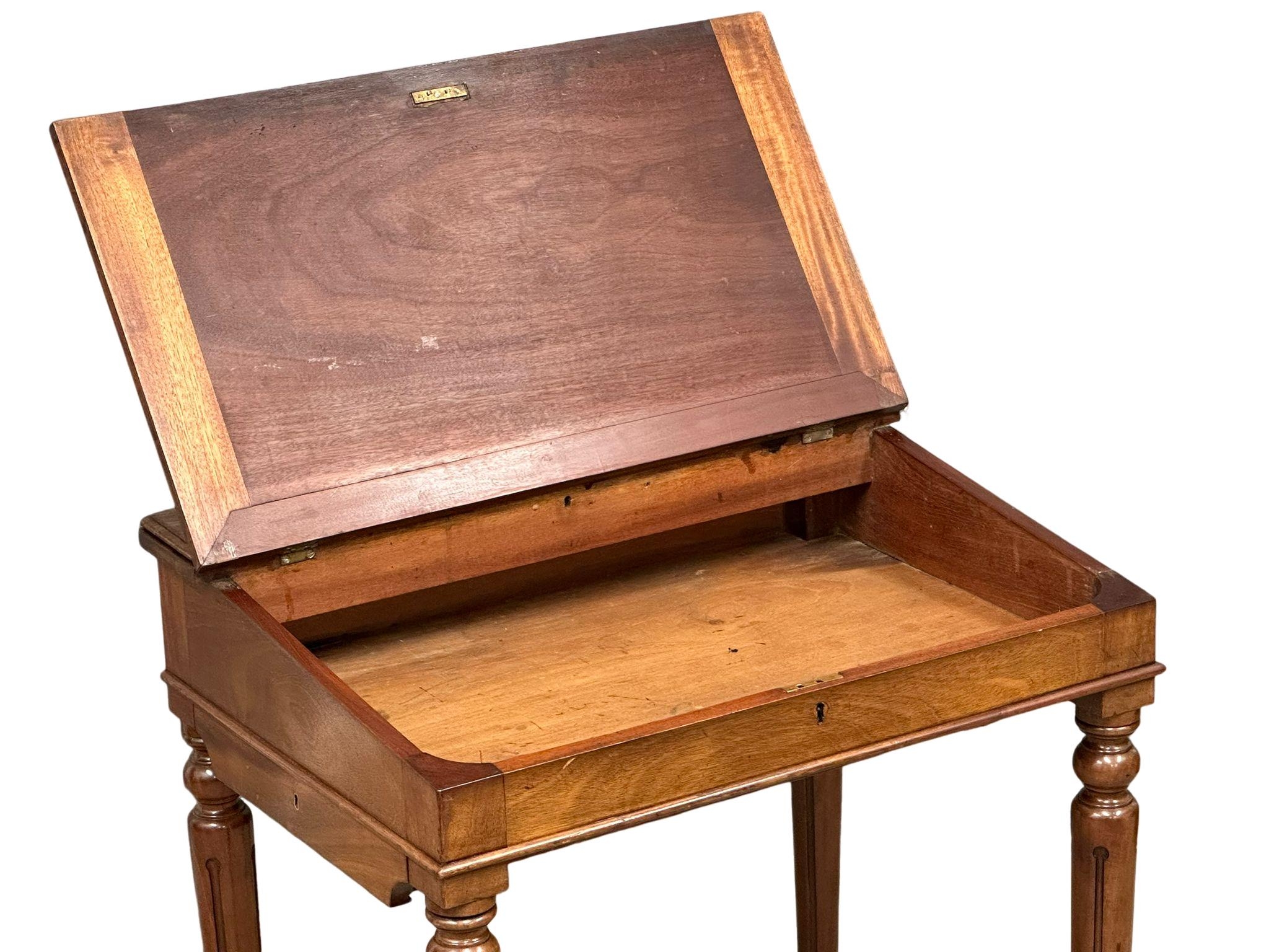 A Victorian mahogany writing desk with leather top hidden drawer. 70x49x78cm - Image 3 of 6