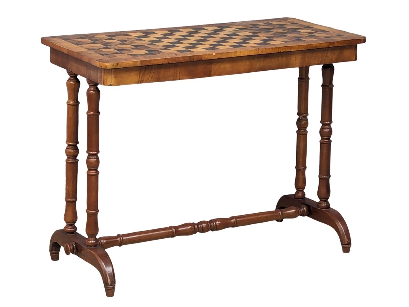 A 19th Century I laid walnut games table with stretcher support, 1870s. 89cm x 44cm x 69cm