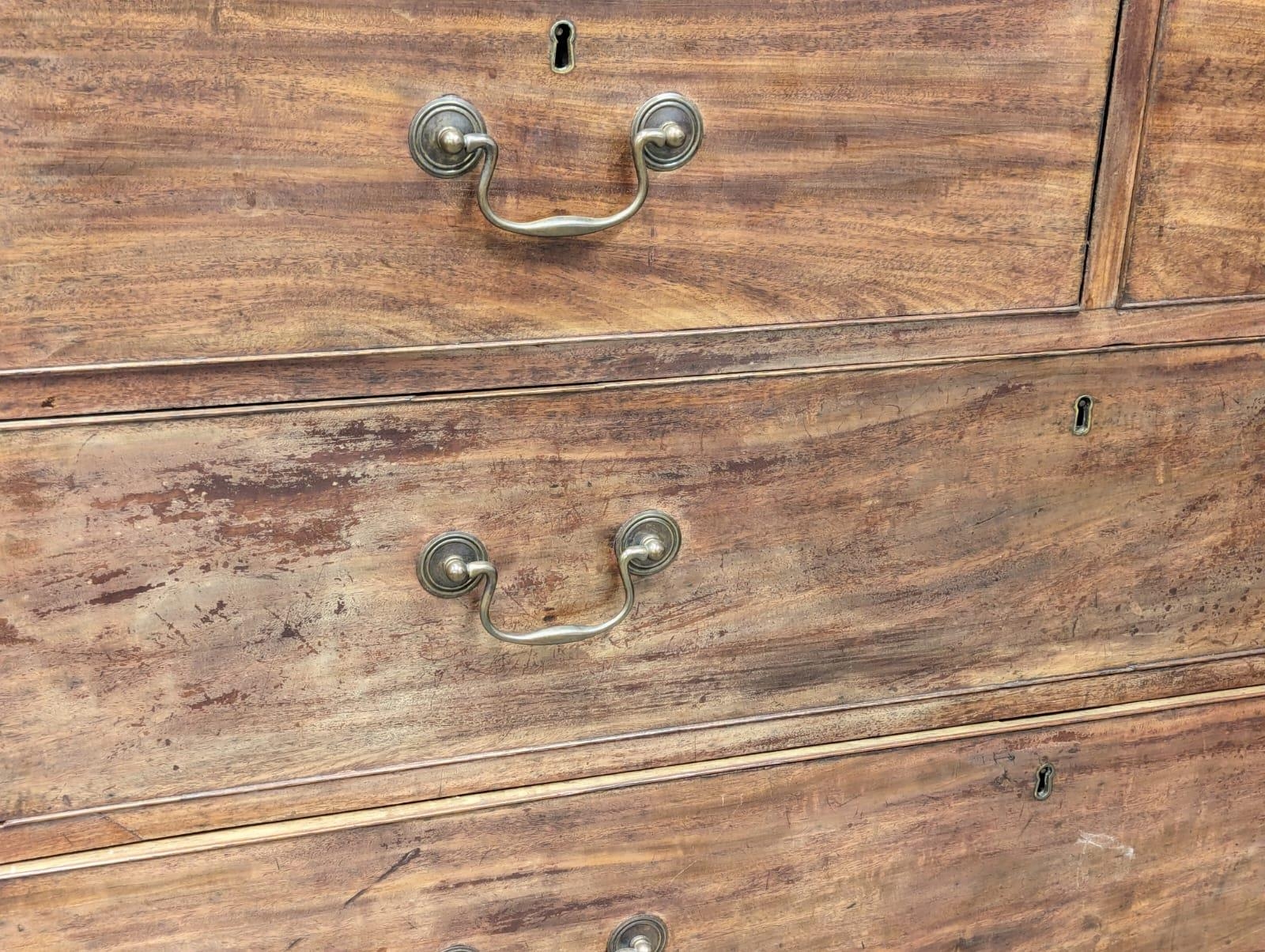 A George III mahogany oak lined chest of drawers on ogee feet and original brass drop handles. Circa - Image 4 of 5