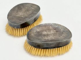 A pair of Late 19th Century Henry Matthews silver backed vanity brushes. Circa 1896. 14x9x6cm