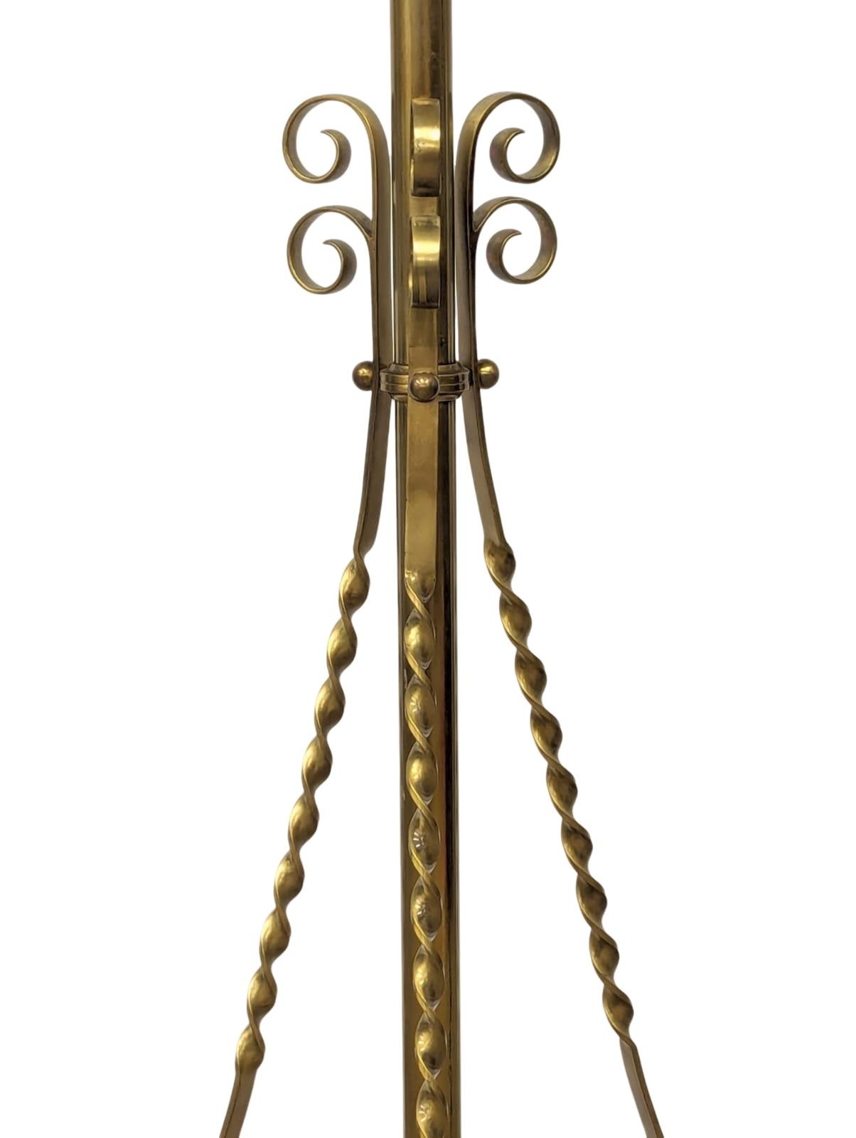 A large Early 20th Century telescopic brass standard lamp on brass lion paw feet. 180cm - Image 3 of 3