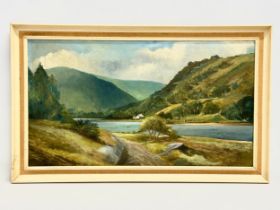 A large oil painting by Edna Sinton. 71x39.5cm. Frame 80x49cm