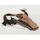 A J. Nunez leather belt and holster with a good quality replica 45 caliber revolver, Single Action