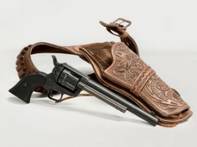 A J. Nunez leather belt and holster with a good quality replica 45 caliber revolver, Single Action