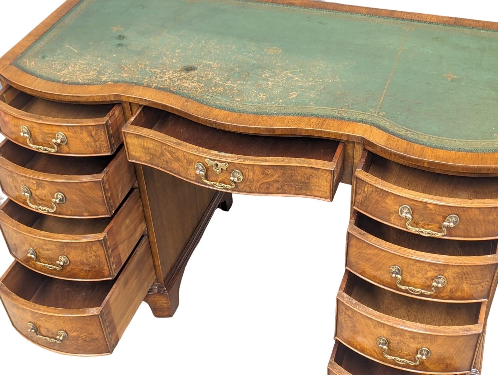 A Georgian style mahogany and burr walnut pedestal desk with leather top. 115x53.5x75cm - Image 6 of 10