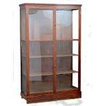 A large Early 20th Century mahogany display cabinet. 126x46x202cm