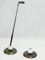 A cast iron golf companion set. 50cm