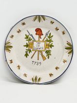 An Early 20th Century French enamelled plate depicting the French Revolution. La Liberte 1789. 23cm