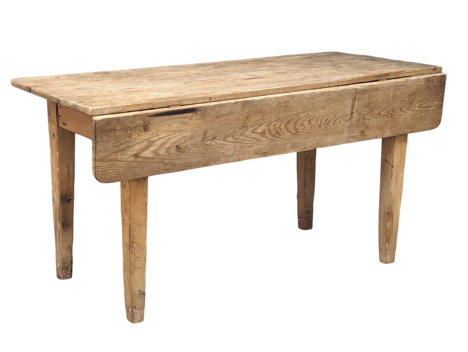 A 19th Century pine farmhouse table on square tapering legs with drawer and 1 drop-leaf, Circa - Bild 2 aus 9